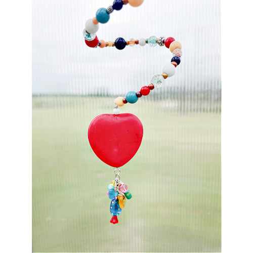 Heartfelt Harmony: Colorful Beaded Slinky Window Hanging