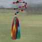 Rainbow Delight: Beaded Slinky Window Decor with Colorful Tassel