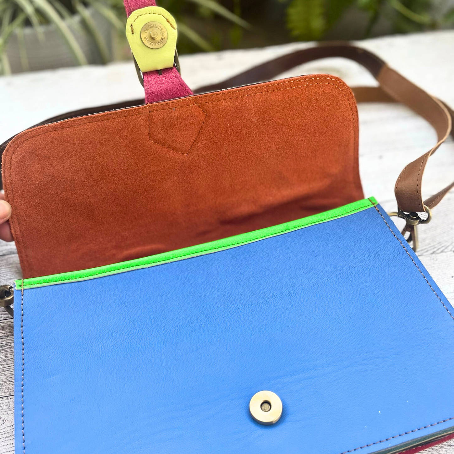 Orange Leather Purse with Polka-dotted Fur Foldover and Blue Buckle