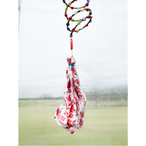 "Boho Prism: Multicolor Beaded Suncatcher with Fabric Tassel"