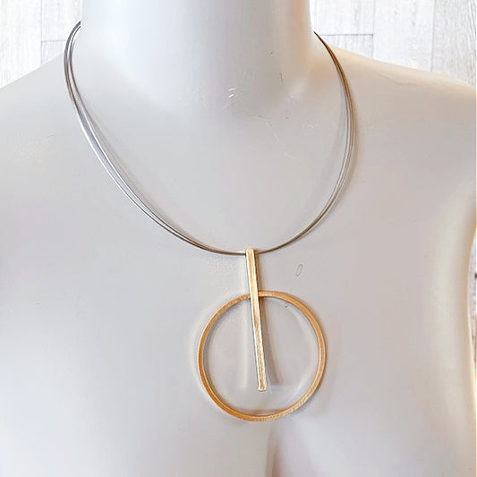 Circular Gold Pendulum Necklace on Silver Multi-Cord